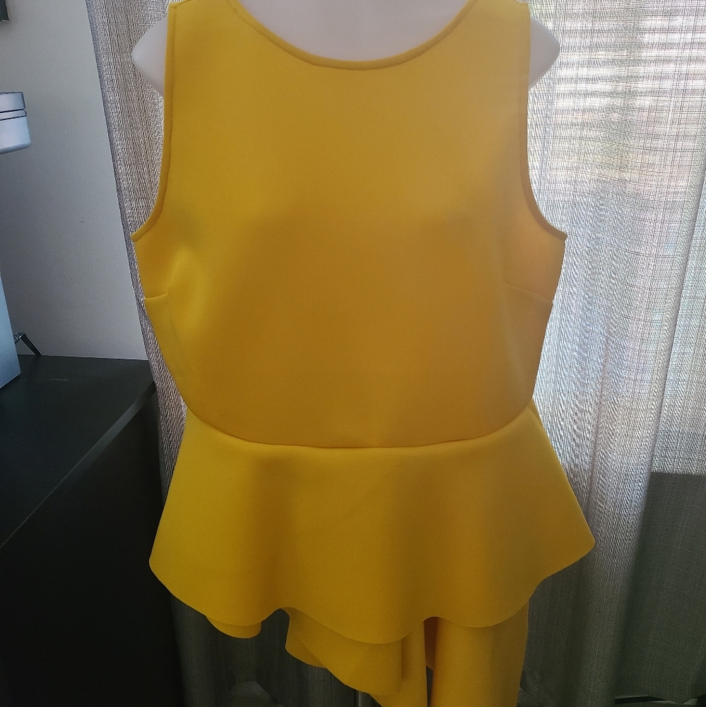 Yellow tank with asymmetrical hem